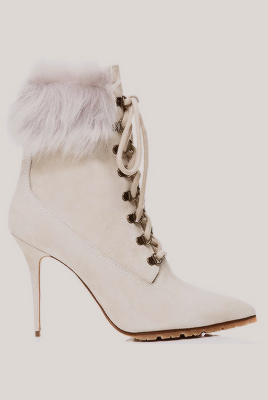 dailyrihannafenty: Rihanna, Manolo Blahnik Partner Again, to Remake Winter Boots  Rihanna and M