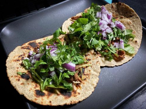 Spicy #barbacoa tacos on green chile tortillas with #onions + #cilantro. #homemadehttps://www.inst