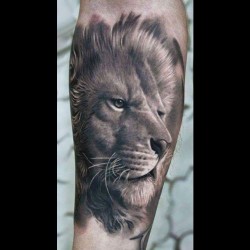 the-tattoobook:  Dope Lion realism piece