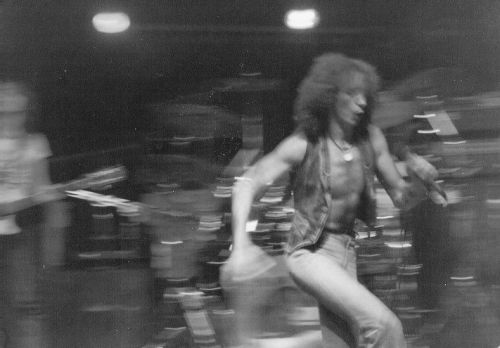 theunderestimator-2:  On the 24th August, 1977, AC/DC literally stormed CBGB, as seen in amazing fuzzy photos by Robert Barry Francos, who really captured the motion and the high energy of an AC/DC show.The band hit New York City  in support of their