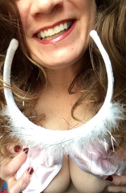sharing-my-smile:  allthingssexyforu: So I have a “great” idea to take some NSFW Easter bunny photos… After my hair became tangled up in the bunny ears, this is the best i could do. Can I be your Easter bunny ?? I still like playing dress up 💕