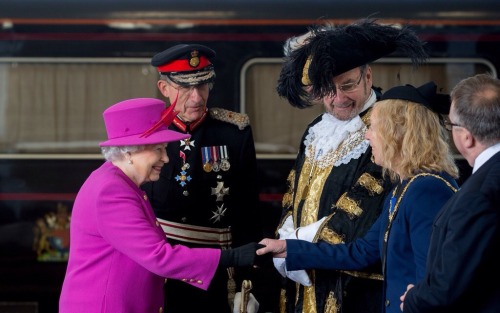 Queen Elizabeth II arrives at Plymouth Railway Station as she visits the city on March 20, 2015 in P