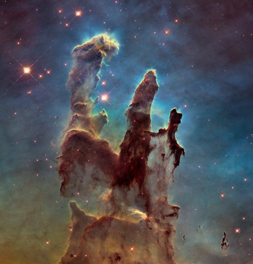 astronomyblog:This image compares two new views of the Eagle Nebula’s Pillars of Creation capt