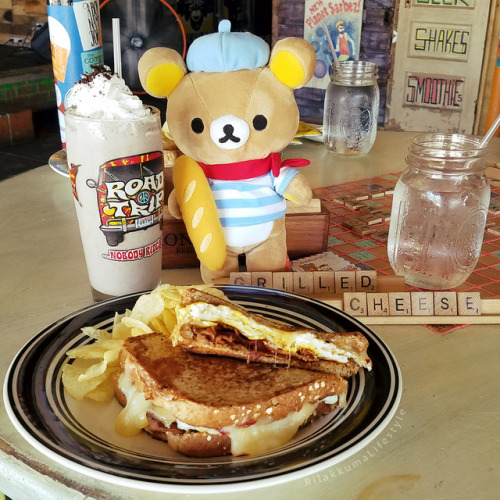 Rilakkuma enjoys a grilled cheese.