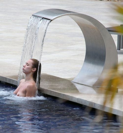 toplessbeachcelebs:  Una Healy (Singer) swimming topless at a resort in Spain (July 2010)