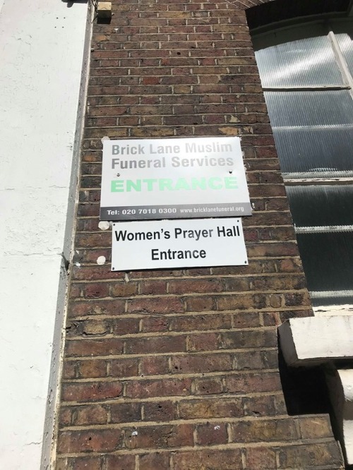 At London’s Brick Lane Mosque, the women’s prayer hall entrance and the funeral services entrance is
