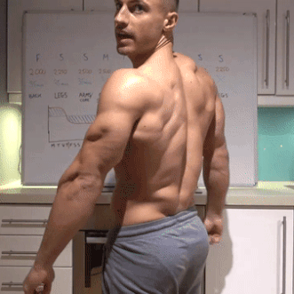 keepemgrowin:  Mike loves to show off the muscles…
