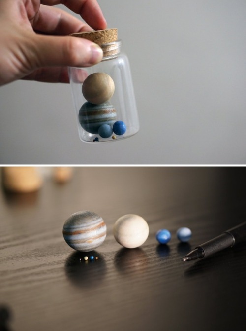 primarybufferpanel: sosuperawesome:  3D Printed Planets and Moons, made to relative or true scale in 1:1.5 billion, 1:1 billion or 1:0.7 billion sizes, sold singularly, in sets, in bottles, or with surface detail relief.  By Little Planet Factory on Etsy