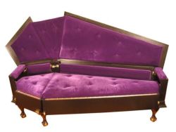 treasures-and-beauty: VonErickson’s Original Coffin Couch,  velvet covered thick foam cushion and classic metal spring construction   seat. It folds up to a fully shut position.Available in purple, red,or  black fabric.  