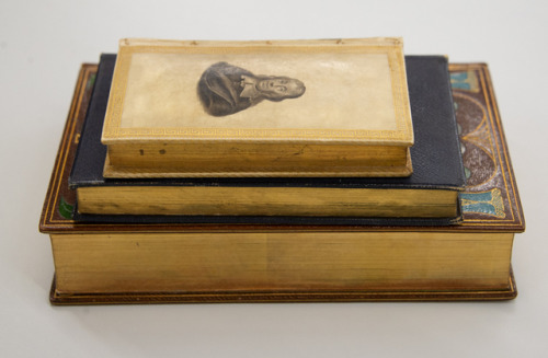 Did you know some books contain hidden images? Fore-edge painting, or decorating the closed leaves o