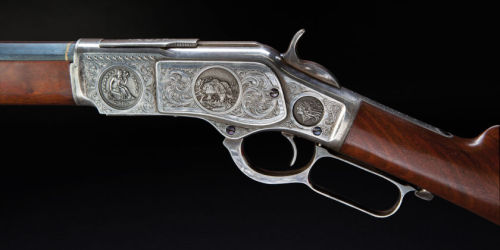 Unique “One of Thirty” relief engraved Winchester Model 1873 lever action rifle.  Specia