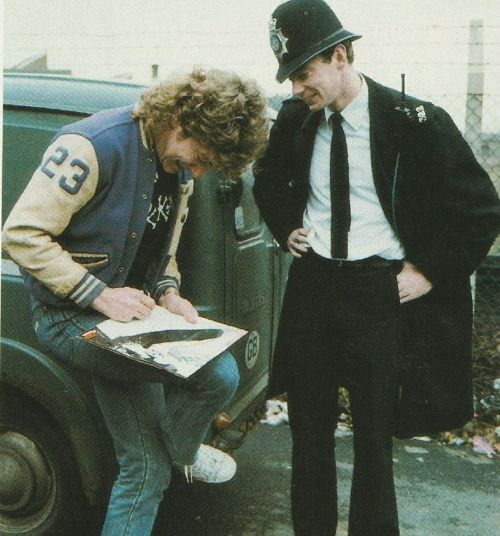Robert Plant signing the first Zeppelin album for a policeman in the early 80’s by Giselle_Met