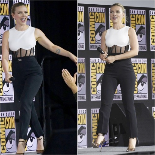 Scarlett Johansson at San Diego Comic Con 2019 (in a David Koma jumpsuit).[Looks like her tattoo is 