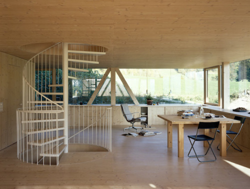 doeyzooey:  Zurich-based architect Pascal Flammer designed this timber house in Balsthal, Switzerland, which is sunken 2.46ft (75cm) with ground-level wrap around windows, connecting it with nature in a special, unique way.  Please….. I want it