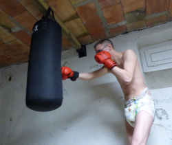 ab-raph:  Training with a crinklz diaper ! Not sure my coach will let me get on the ring like that ! :D 