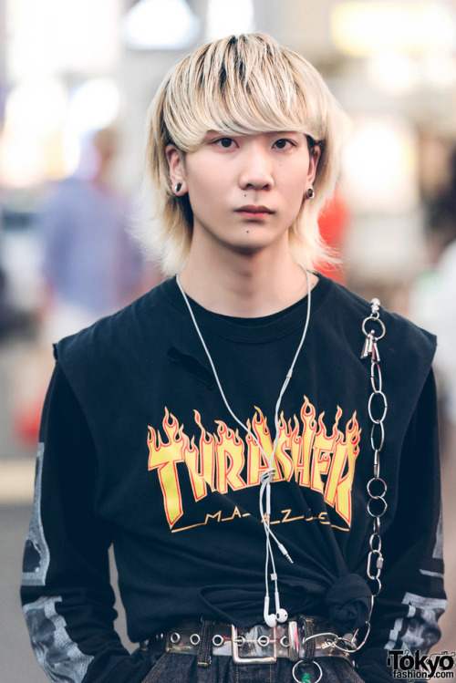 19-year-old Daiki on the street in Harajuku wearing a sweatshirt by the Japanese streetwear brand Ca