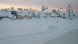  Snow covers a street in Buffalo on Wednesday,