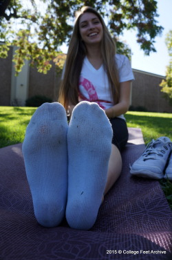 collegefeetarchive:  Here’s 18 year-old Mari and her size 8s. I just got out of the rec center when I noticed this stunning beauty waiting outside before her yoga class started. I couldn’t resist approaching despite being a sweaty mess.“You want