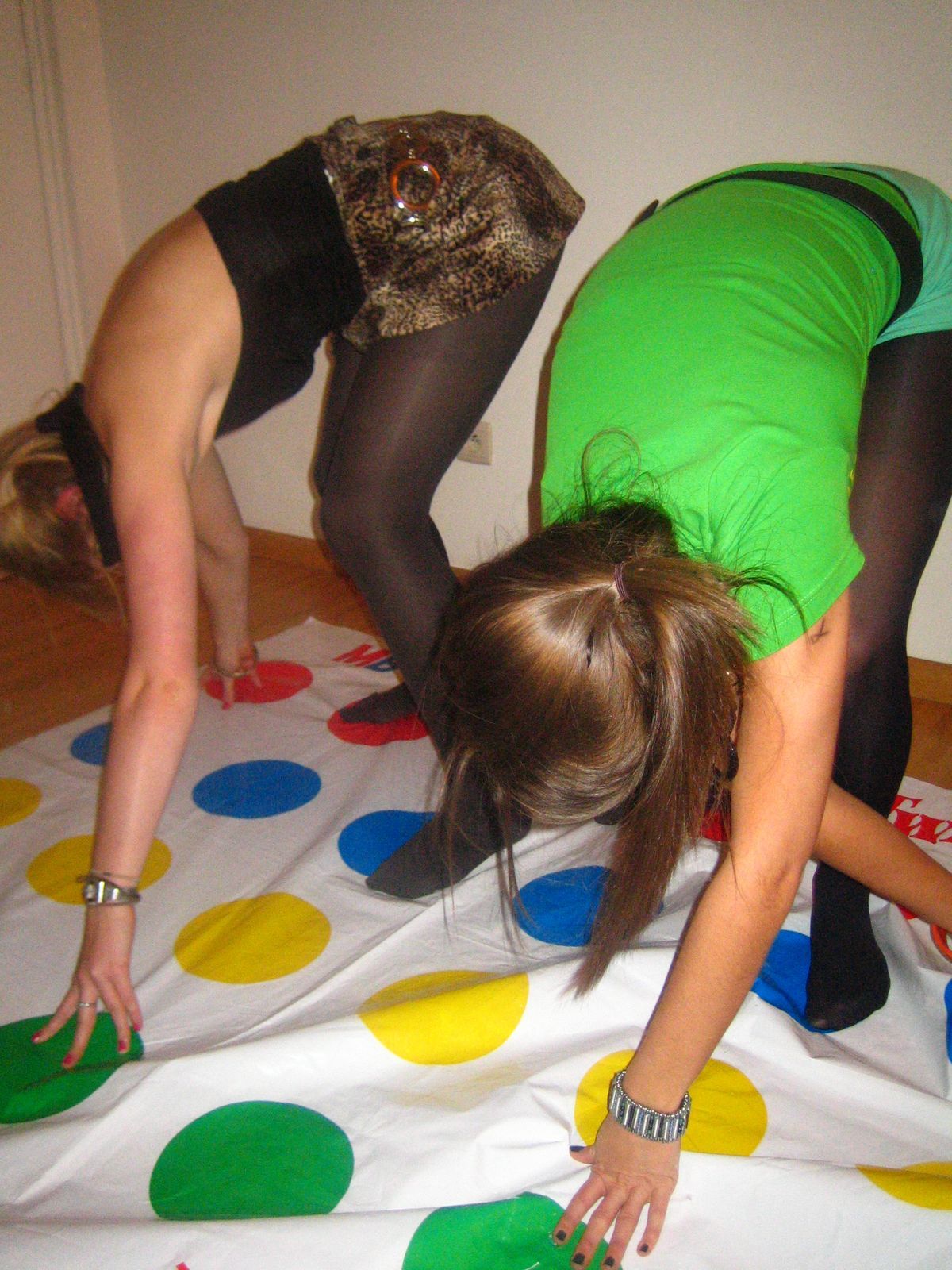tightsobsession:  Playing twister in tights. Tights week starts November 3rd! 