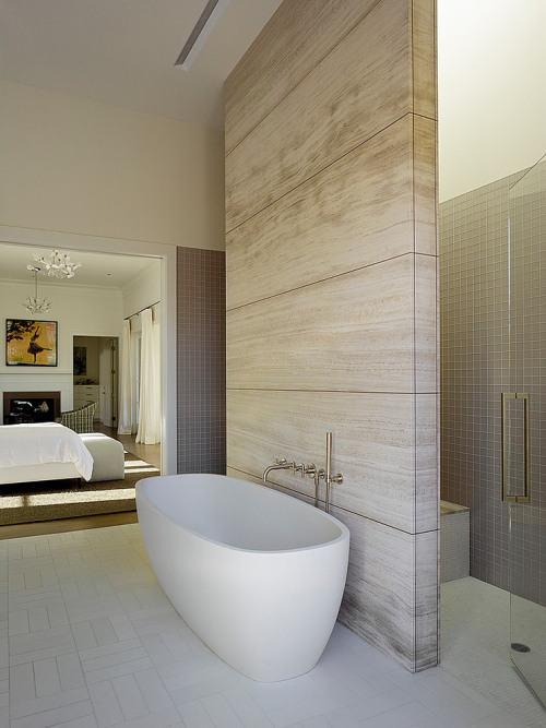 {This home by Kara Mann and Andrew Mann (husband and wife?) has a nice twist on traditional - modern