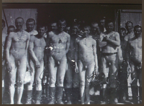 vintagemusclemen: This one is odd, and not of the best quality.  These may be Finns outside a sauna 