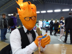happykittyshop:  flaneurziggy:  A serious shout out to my bff Joel that made the most amazing and stunning Grillby cosplay ever! He spent a lot of time making that mask and getting the lightning effect just right and it payed off really well!It was so