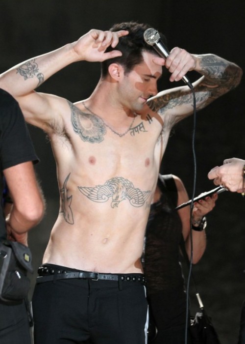 malearmpits:  I’m in a very Adam Levine mood right now, was sorting out my folder and this guy’s pits (sweaty and dry) are super whoah! *drools* and damn those tattoos! Argh! :D 