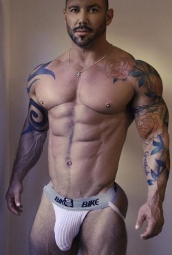 musclerod8888:  wrestlehead:  Scott Cullens  Scott has got a few more tats……not sure if the flowers suit his bad boy image……just saying ! 