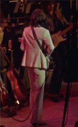 harrisonstories:  “George was wonderful on the guitar. His little legs would kick