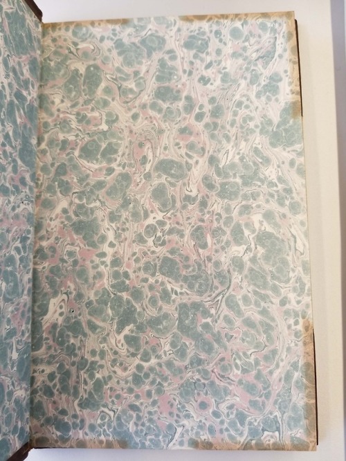 Variation in marbling pattern between front and back pastedownsFrom: Cowell, John (Nurseryman). A tr