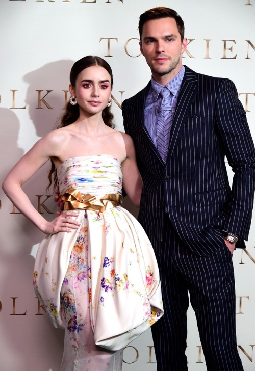 LILY COLLINS and NICHOLAS HOULT at the UK premiere of TOLKIEN