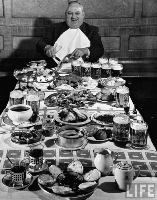 Frank Scherschel - Carpenter, George Boehler, eating each of his six meals a day, Munich, Germany, 1954.