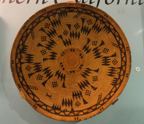 Basketry tray of the Chumash people, California.  Artist unknown; early 19th century.  Now