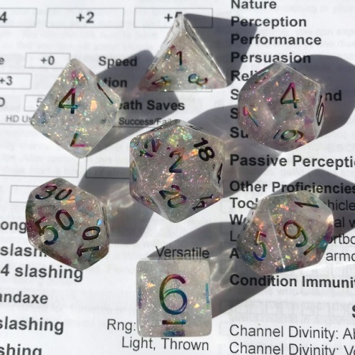 battlecrazed-axe-mage: Surpriiiiiise–I made ‘em rainbow!  These are Cozy Gamer’s Celestial dice with
