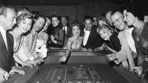 Tempest Storm (center) at the Dunes, c. 1958. Posed photo by Bruno Bernard, aka Bernard of Hollywood