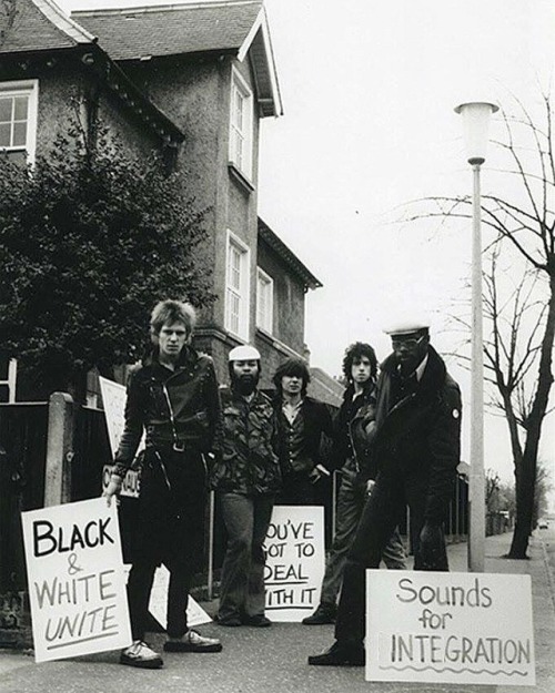  Members of Steel Pulse, The Clash, and the Sex Pistols demonstrating outside far right National Fro