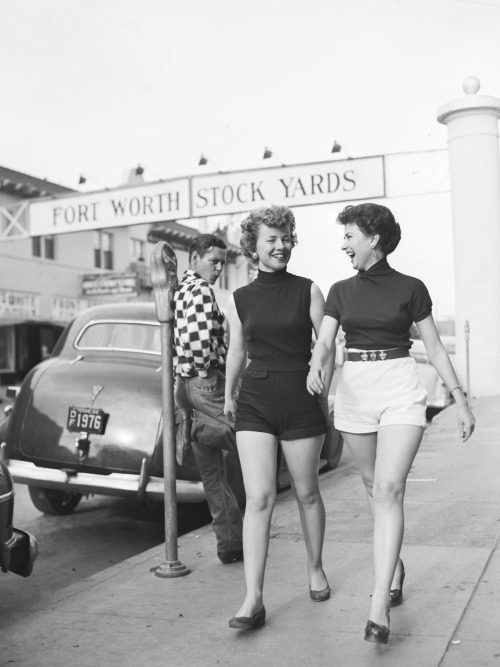 dtxmcclain:  Fort Worth, Texas, 1952. Beverly Ann Ellis (left) and Shirley Beech draw an admiring whistle from Travis C. Ihrasher as Fort Worth became shorts concious after Mrs. F.H. Wilson asked the City Council to ban their wearing in public. Mrs. Wilso