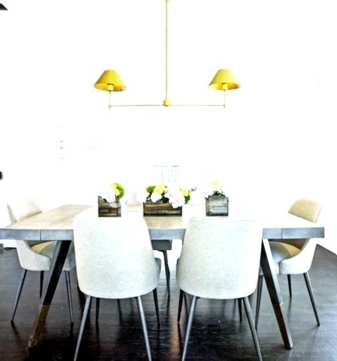 Enclosed - Dining RoomLarge Enclosed Dining Room With A Dark Wood Floor And A Brown Floor And White Walls