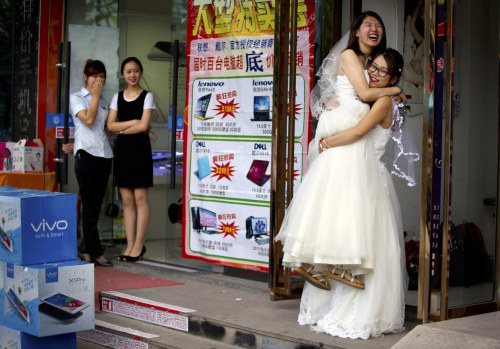 drinkyourfuckingmilk:  beautiful-brides-weddings:Rather than waiting for the Chinese government to recognize their right to marry, Teresa Xu and Li Tingting held an informal ceremony in Beijing in June 2015.