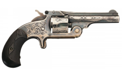 peashooter85:  Engraved and plated Smith and Wesson Model 1 1/2 .32 caliber pocket revolver.  Originally this pistol would have been nickle plated but after years of carry the plating has mostly worn off.