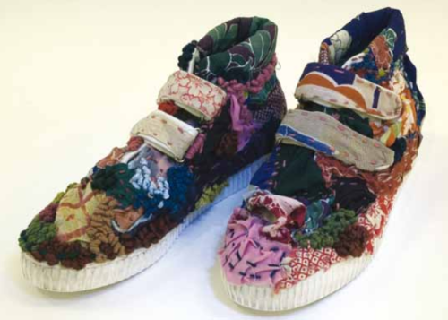 estradiolvalerate:Patchwork sashiko stitched boots in the exhibition “Japanese Sashiko Textiles,” Yo