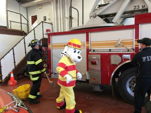 Sparky the Fire Dog helps the crews this morning washing apparatus. ‪#‎keepingyousafe‬ Remember to c