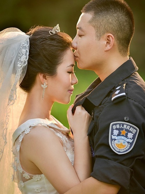 themarsultor:  officialfrenchtoast:  Chinese SWAT officer unable to get time off 24 hr shift to take wedding photos. Studio comes to his station instead. [via]  Everybody needs to step they game up I swear this shit goes so hard. 