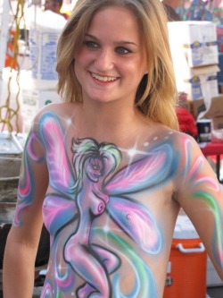 southbeachcandids:  Super Hot Cutie shows off while getting bodypainted at Fantasy Fest.  