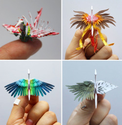 archiemcphee:  Today the Department of Outstanding Origami is catching up on some of the spectacular origami cranes that artist Cristian Marianciuc (previously featured here) has been making. Over the last three year Marianciuc has created a dazzling