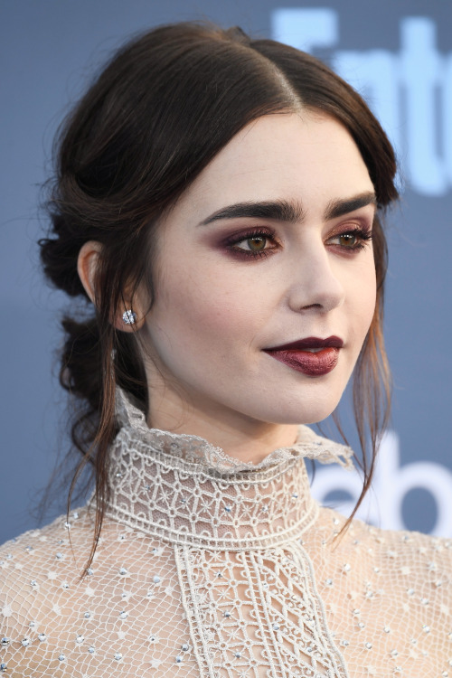 celebrities-hq:Lily Collins attends The 22nd Annual Critics’ Choice Awards at Barker Hangar on Decem