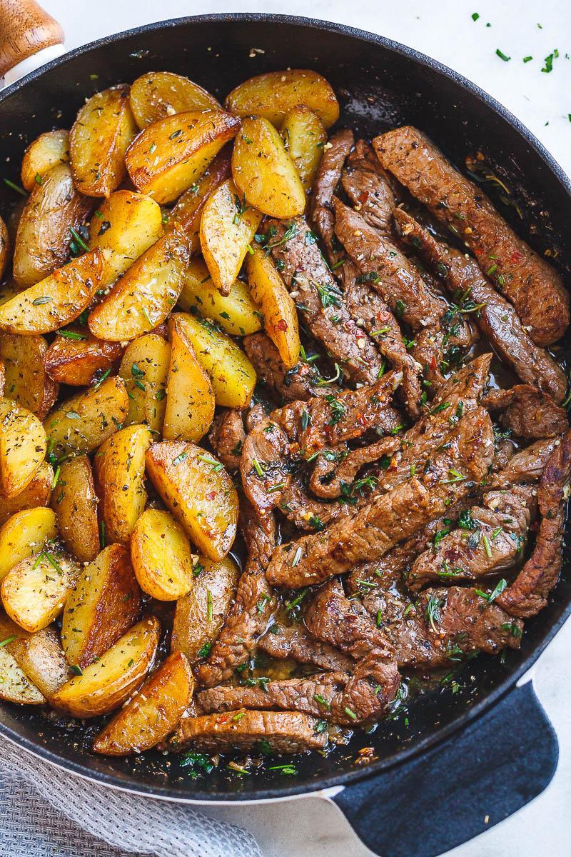 food-porn-diary:  Garlic Butter Steak and Potatoes Skillet [800x1200]