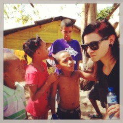 skrillex:  My new friends I met in the barrio …they live on dirt floors, don’t speak any English but were OBSESSED with my gauges and we had the best timezs ❤ 