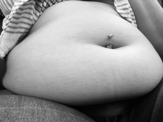 growingbellybabe-deactivated202:My belly doesn’t just hang over the seat belt… it engulfs it. My bellybutton ring has been doing fine until recently. I’m noticing it’s getting tighter as my belly inches towards the steering wheel. 