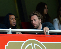 aintnojigga:  Jay-Z was spotted with friend Chris Martin in North London on Sunday, watching the Barclays Premiership football game between Arsenal and Manchester United at the Emirates stadium. Jay-Z showed interest in Arsenal three years ago, when